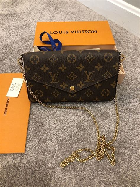 louis vuitton black purse gold chain|louis vuitton black checkered bag.